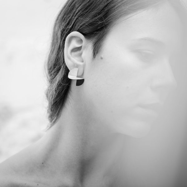 handmade Recycled silver studs with a natural silver surface and an oxidised silver surface