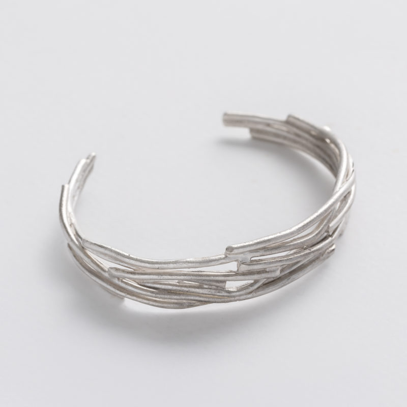 abstract shape cuff bracelet with interlocking recycled silver wires