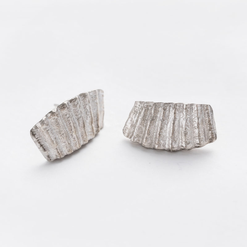 Handmade silver seashell stu earrings. Recycled silver stud earrings with a seashell pattern