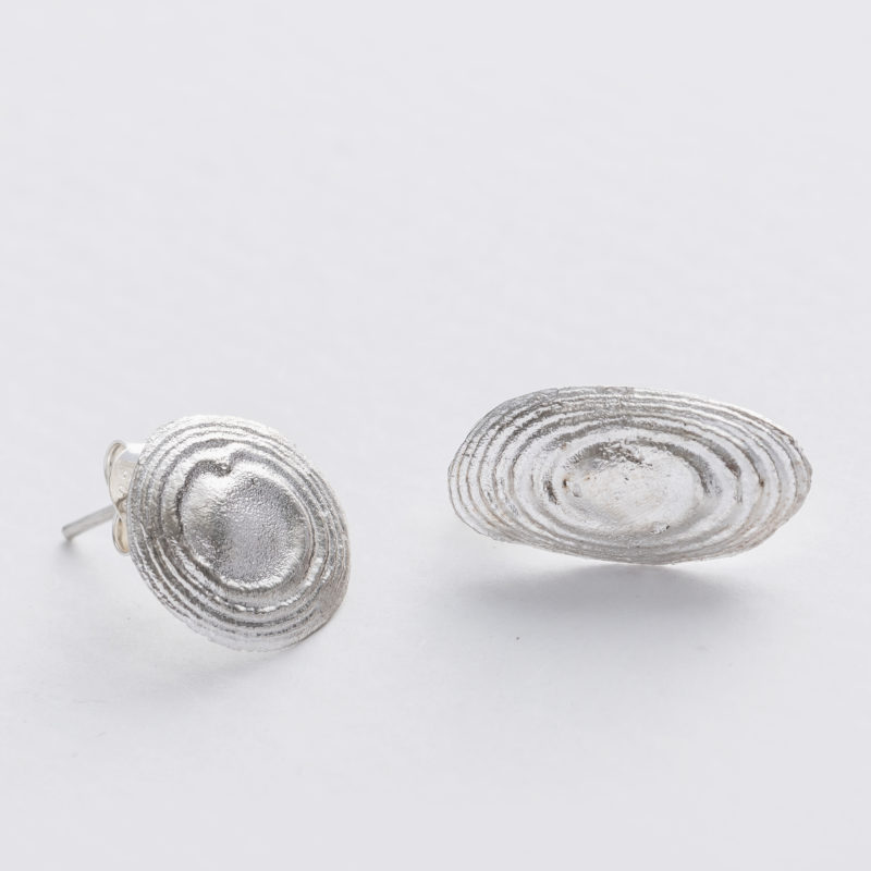 Handmade water swirl silver mismatched studs