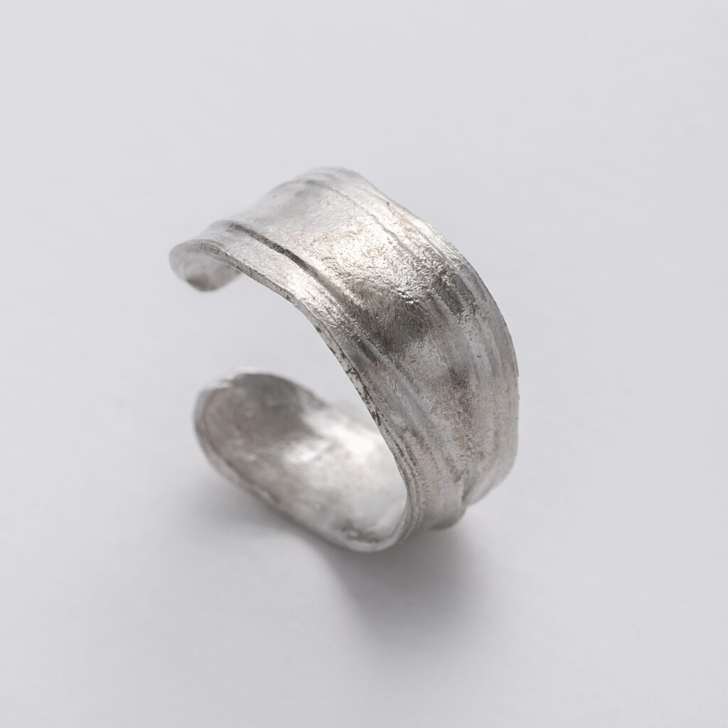 handmade small recycled silver adjustable ring with swirl design